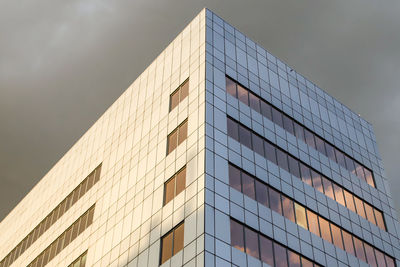 Low angle view of modern building against sky