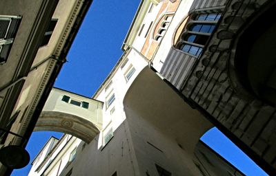 Low angle view of building against blue sky