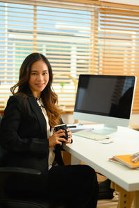 Businesswoman working at office