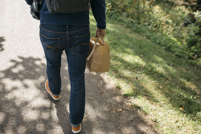 Man carrying paper bag