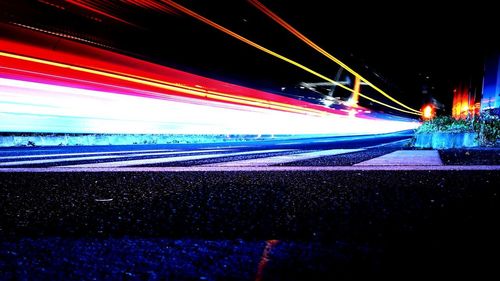 Light trails on street in city at night