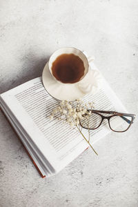 High angle view of coffee cup on table