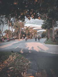 People walking on road in city