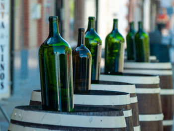 Close-up of wine bottles on table