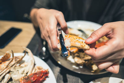 Close-up of man eating food