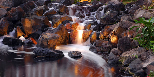 High angle view of stream through rocks