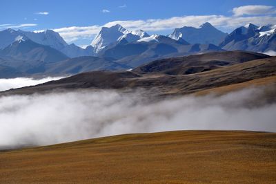 Scenic view of mountains during foggy weather