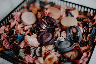 High angle view of make-up on table