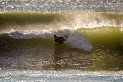 Man surfing in sea