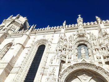 Low angle view of cathedral against clear blue sky