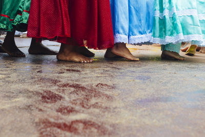 Low section of women dancing during yemanja festival