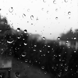 Close-up of water drops on glass