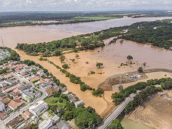 Flooded river with mud after construction of dam