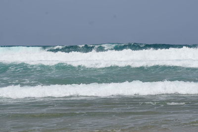 Scenic view of sea against clear sky