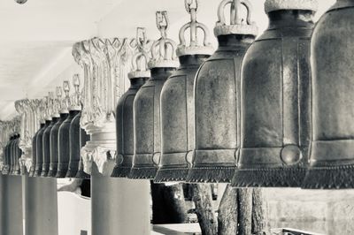 Row of empty bottles in shelf