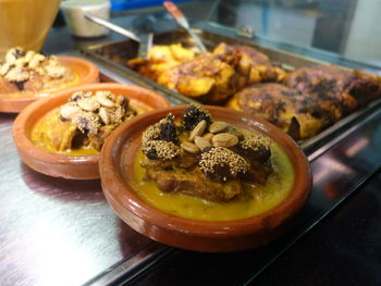 Close-up of appetizers on food bar