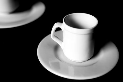 Close-up of coffee cup on table