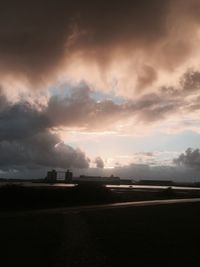 Highway against storm clouds