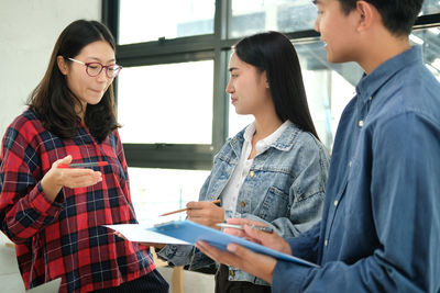 Business person discussing in office