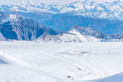 Completely snow-covered field in diablerets glacier 3000 where winter sports are practiced