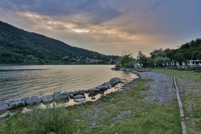 Scenic view of lake against sky during sunset