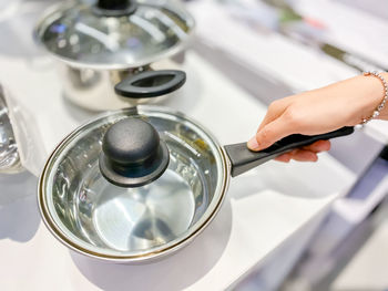 High angle view of person having tea