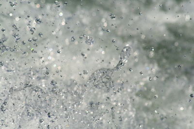 Close-up of water drops on glass