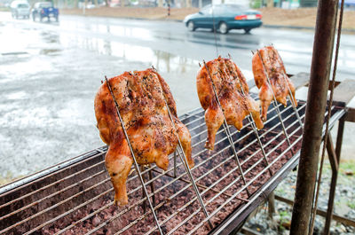 Close-up of meat on barbecue grill