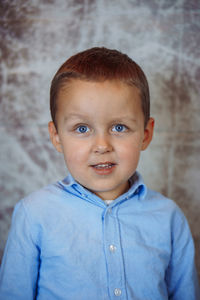 Portrait of cute boy looking away