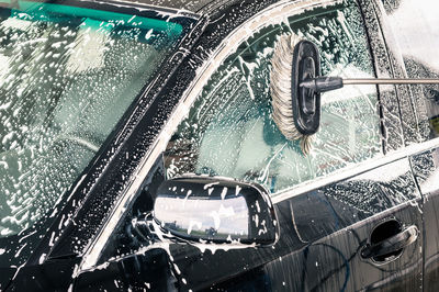 Cleaning equipment on car window