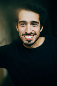 Portrait of young man smiling