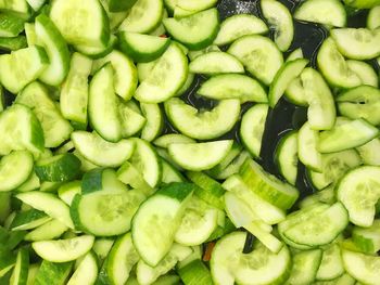 Full frame shot of cucumber slices in plate