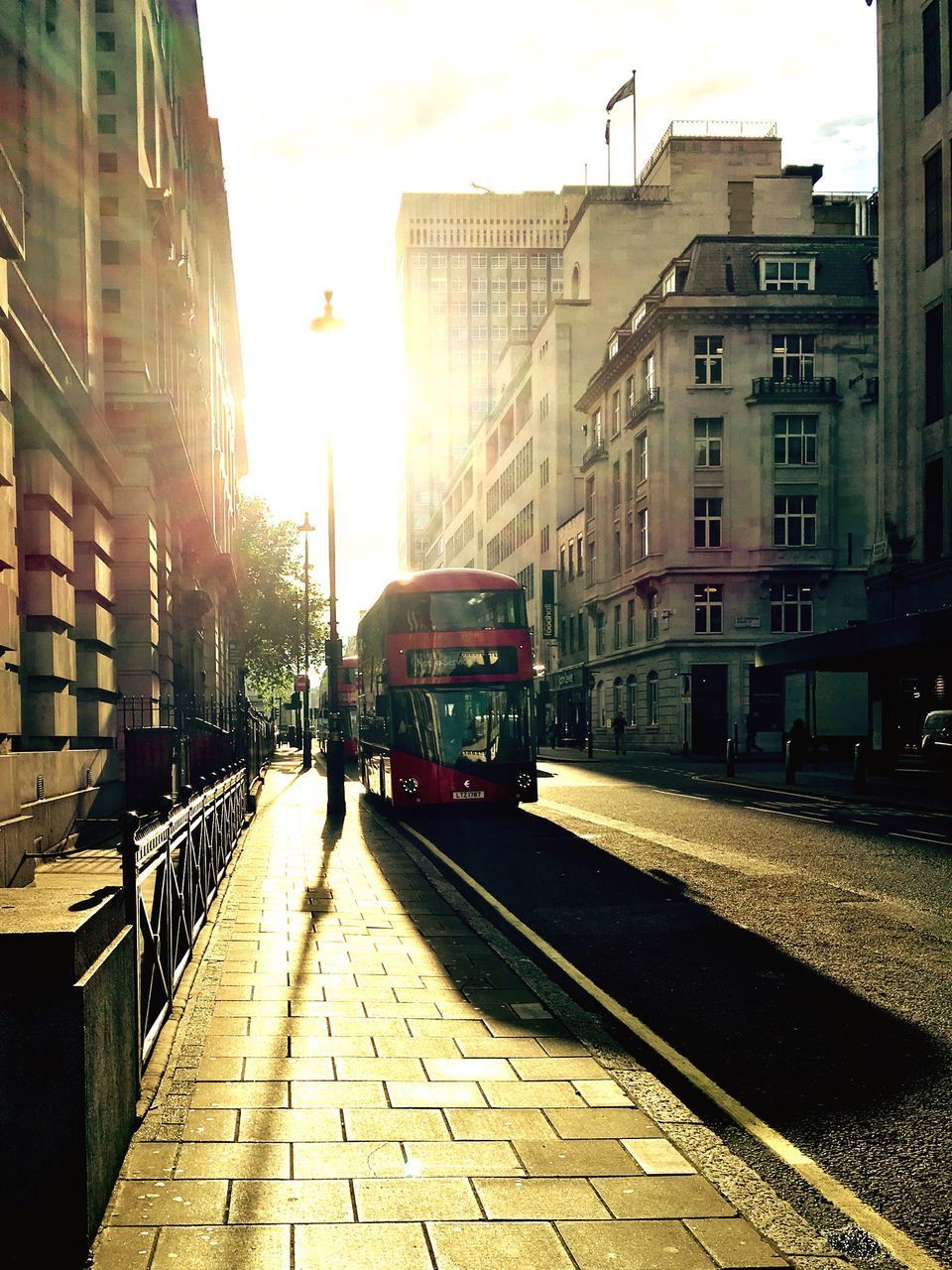 STREET AMIDST CITY AGAINST SKY