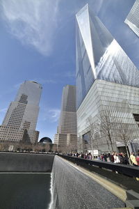 Low angle view of skyscrapers against sky