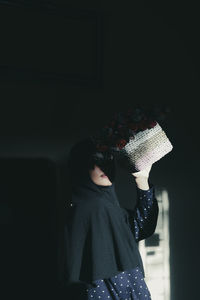 Woman holding flowers