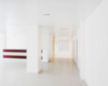 Defocused image of empty corridor of building