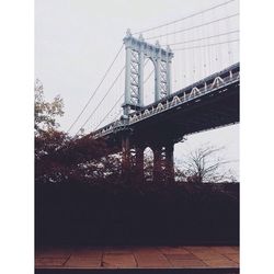 Low angle view of bridge over river