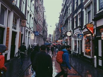 People walking on street in city