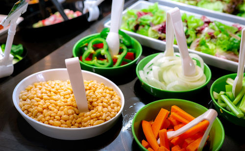 Salad bar buffet at restaurant. fresh salad bar buffet for lunch or dinner. healthy food. beans.