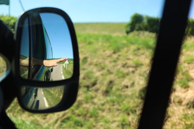 Close-up of car on side-view mirror