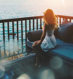 Rear view of woman looking at sea