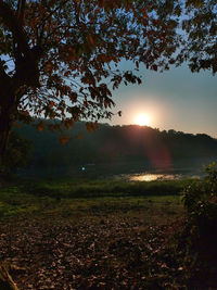 Scenic view of landscape against sky during sunset