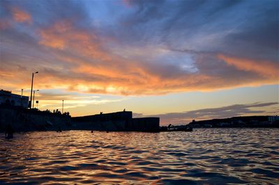 Scenic view of sea at sunset