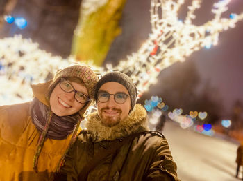 Portrait of smiling young woman in winter