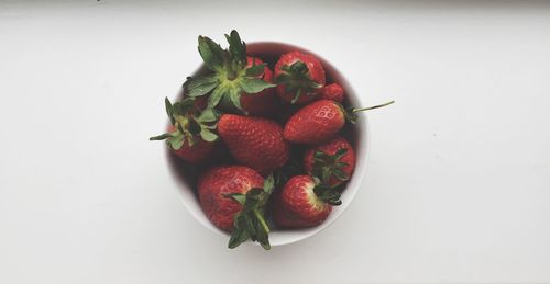 Close-up of strawberries on white background