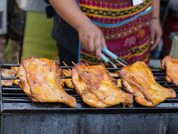 Close-up of meat on barbecue grill