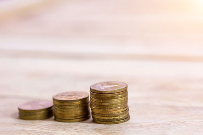 Close-up of coins on table