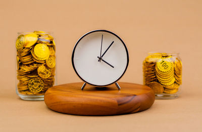 Close-up of alarm clock on table