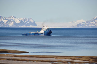 Ship with glacier