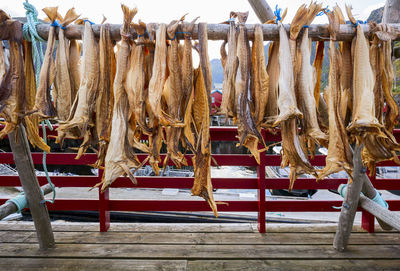 Clothes drying on clothesline at market stall